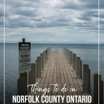 View down wooden pier on Lake Erie with text Things to do in Norfolk County Ontario