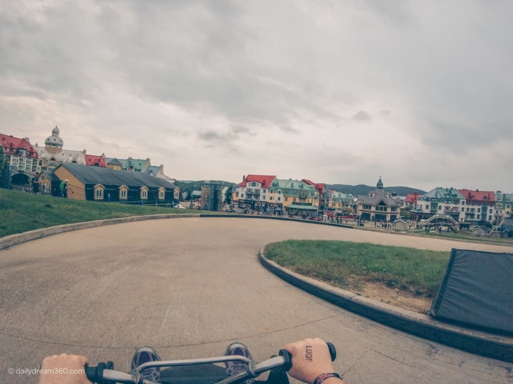 Riding into the village on luge at Tremblant