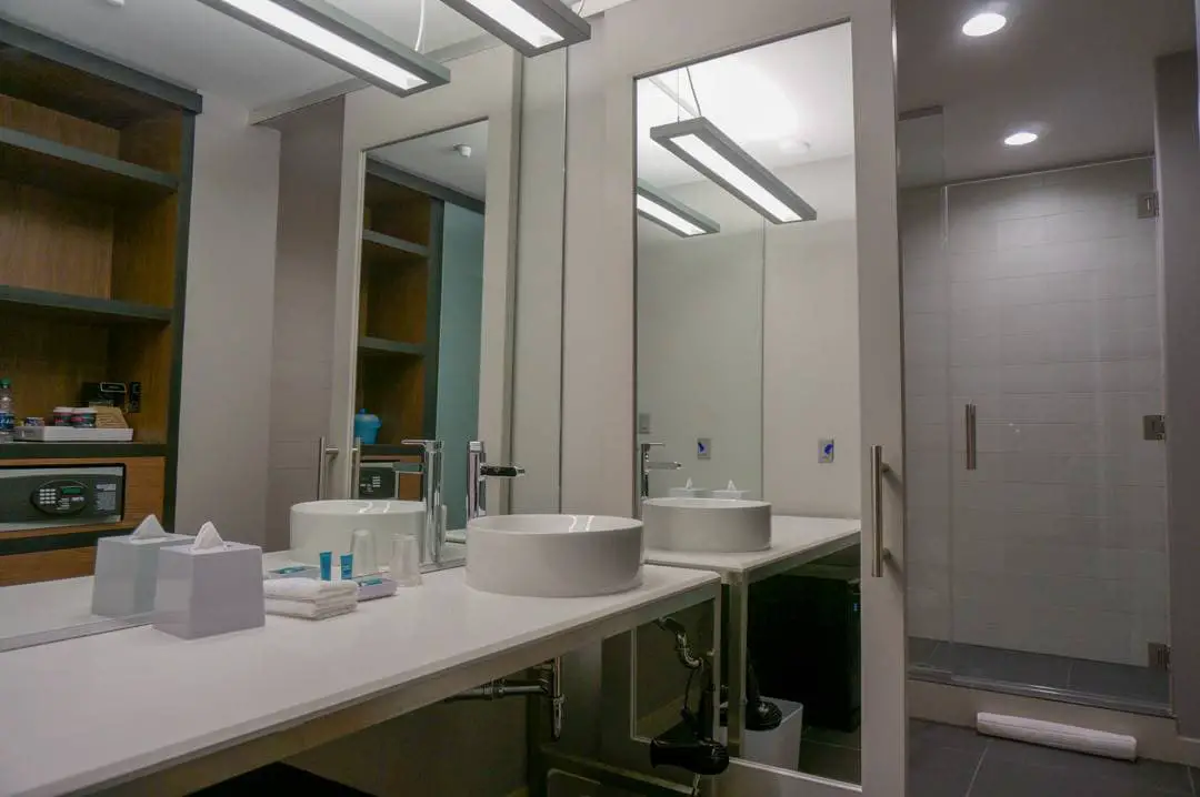 Bathroom sink and bliss beauty products at Aloft Houston Downtown review