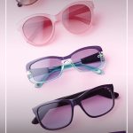 Multiple sunglasses spread out with text Buying The Right Sunglasses: The 10 Best Classic Sunglasses Styles