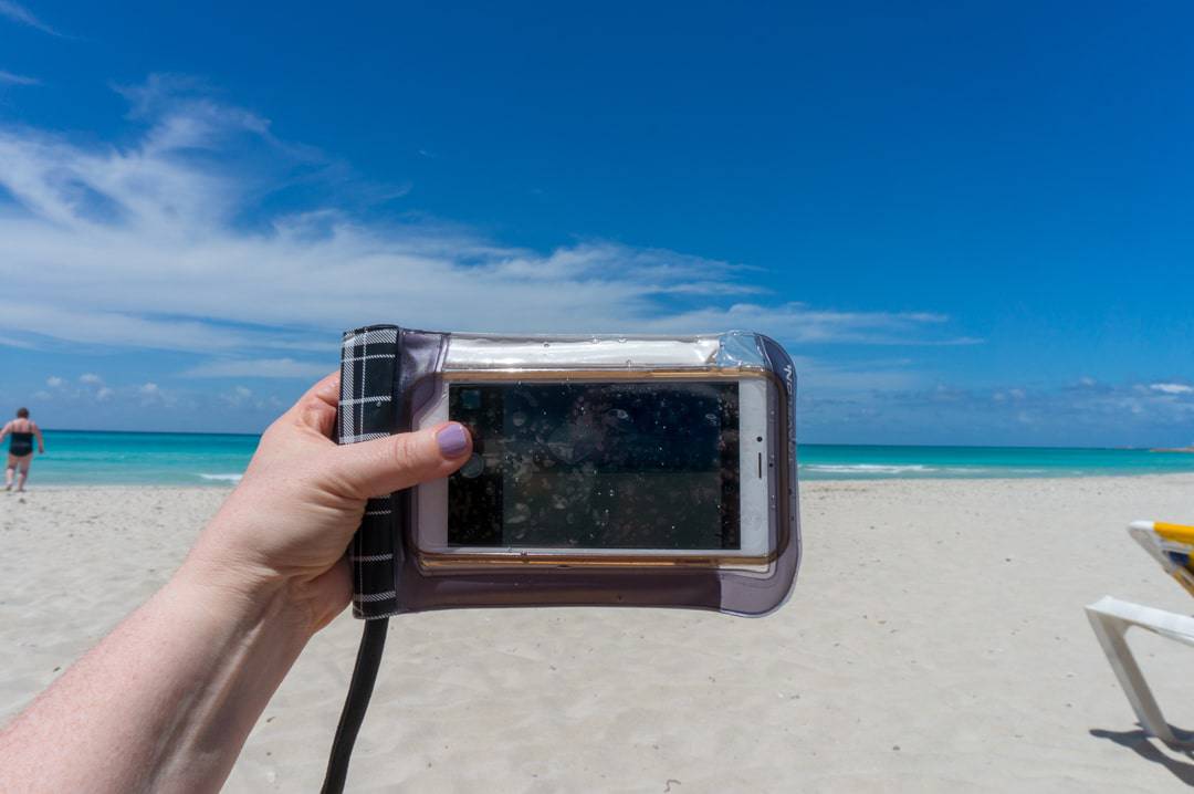 Travelon waterproof smartphone pouch still allows you to use the phone