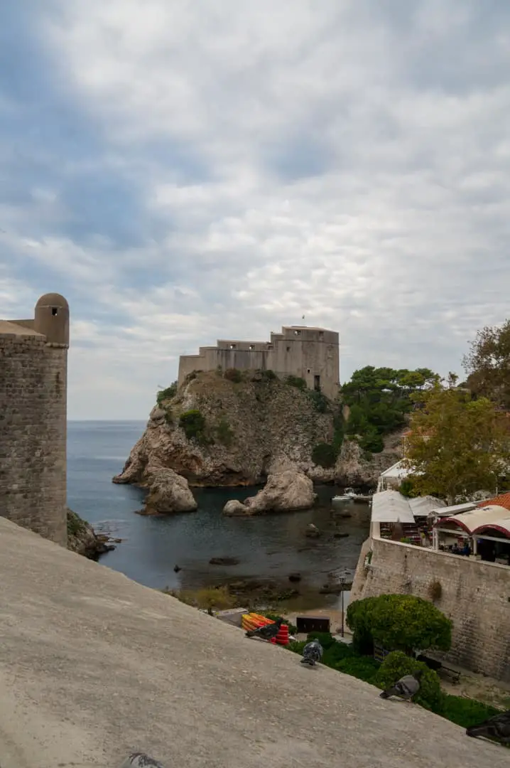 If you are looking for things to do in Dubrovnik Croatia one of the most popular attractions by far is the Dubrovnik City Walls Walk. This self-guided walk offers spectacular views of Dubrovnik and its shores. In this post, we share some great tips on things you need to know about the Dubrovnik wall walk including some tips for photographers on the location of the sun for the best shots of the city. | #croatia #dubrovnik #wallswalk #thingstodo #gameofthrones #attraction|
