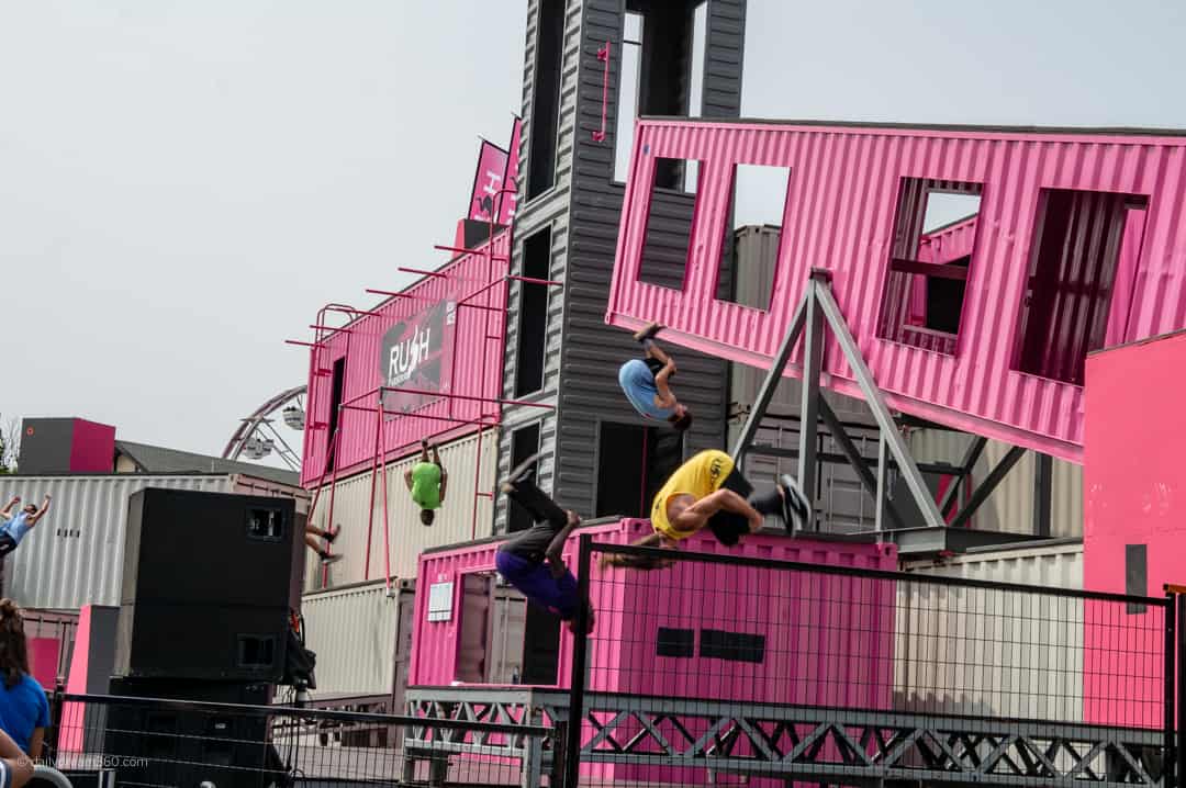 Parkour experts flip in the air on stage at CNE