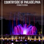 Close up of water fountains lit up in purple and pink at Longwood Gardens