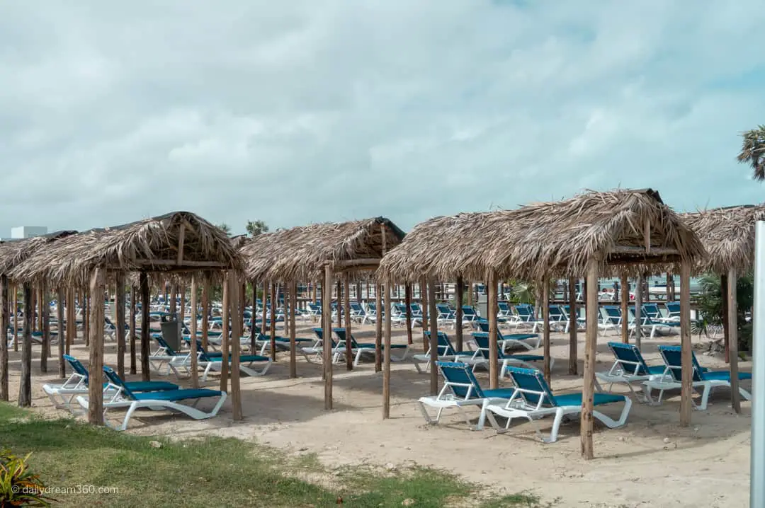 Beach chairs in sand at Playa Pilar Resort Cuba