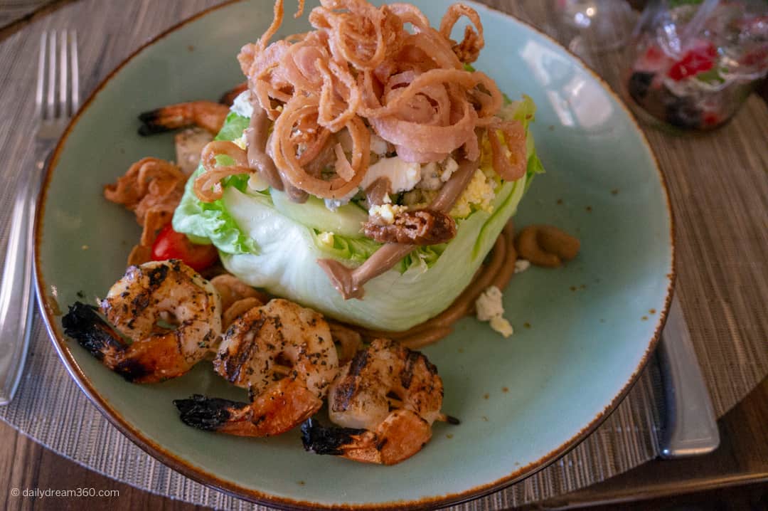salad with grilled shrimp at Coast Restaurant