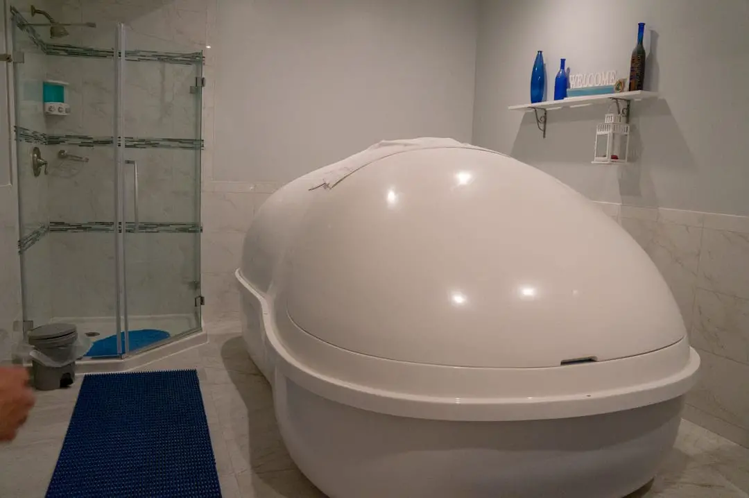 Inside the salt tank room, tank closed, shower Discovering the Benefits of Salt Therapy at the Salt Spa of St. Augustine
