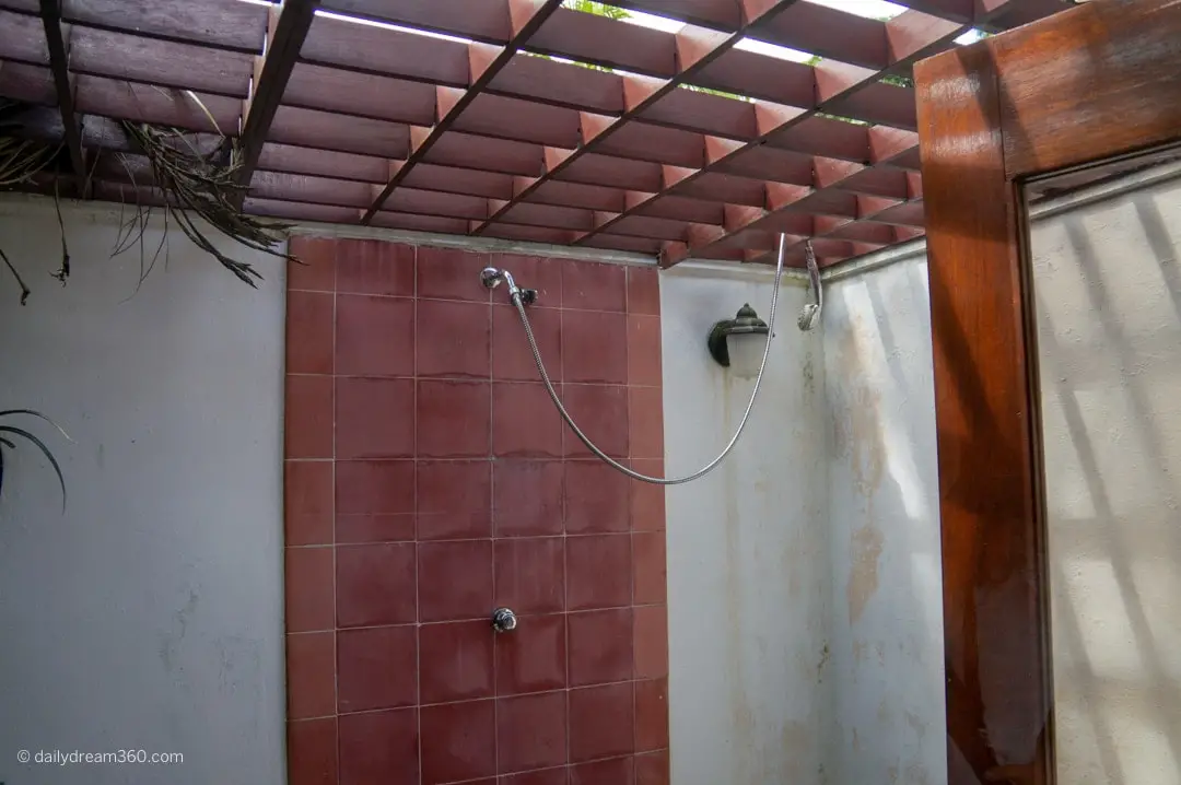 Outdoor shower in Community room inside someones house in Las Terrazas Cuba