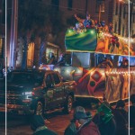 Mardi Gras float passes by crowd in downtown Lafayette Louisiana