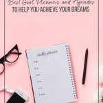Assorted planners on table desktop with text Best Goal Planners to Help You Achieve Your Dreams