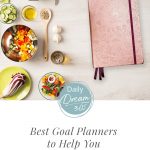 Planner next to healthy food on table