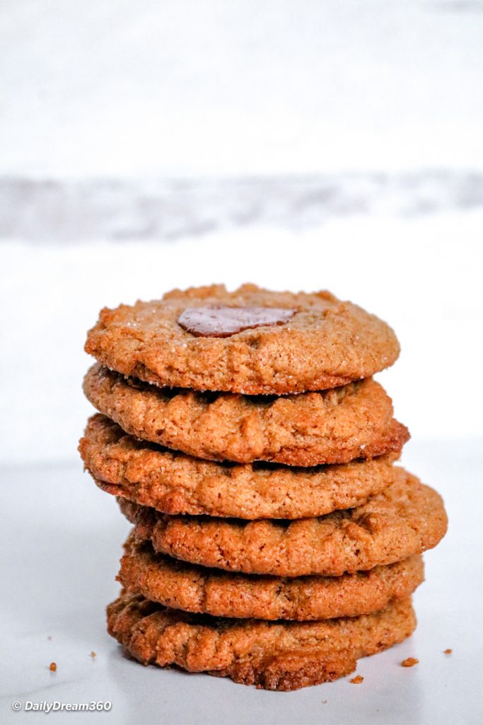 Stacked Keto Almond Butter Cookies with Chocolate on countertop