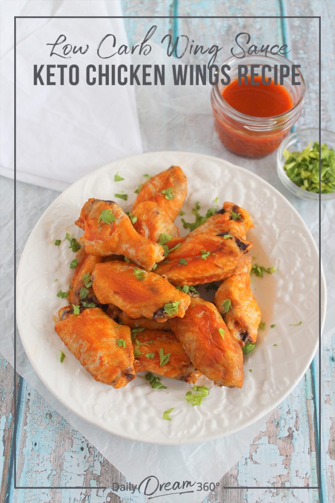 Keto wings on white plate with sauce and napkin and text: Low Carb Wing Sauce Keto Chicken Wings Recipe