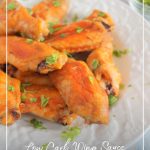 Keto wings on white plate with sauce and napkin and text: Low Carb Wing Sauce Keto Chicken Wings Recipe