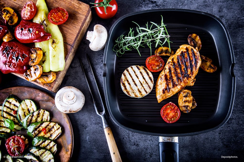 Grilled food on counter in grill pan