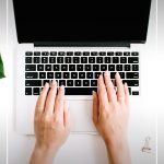 overview of desk with computer with text How to Start a Successful Blog While Working Full Time