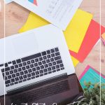 overview of desk with computer with text How to Start a Successful Blog While Working Full Time