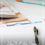 Stack of cookbooks with text How to Detox Sugar with the Best Books on Quitting Sugar (pin image)