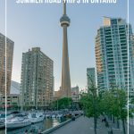 Toronto Waterfront view of CN Tower with text: Destinations for Summer Road Trips in Ontario