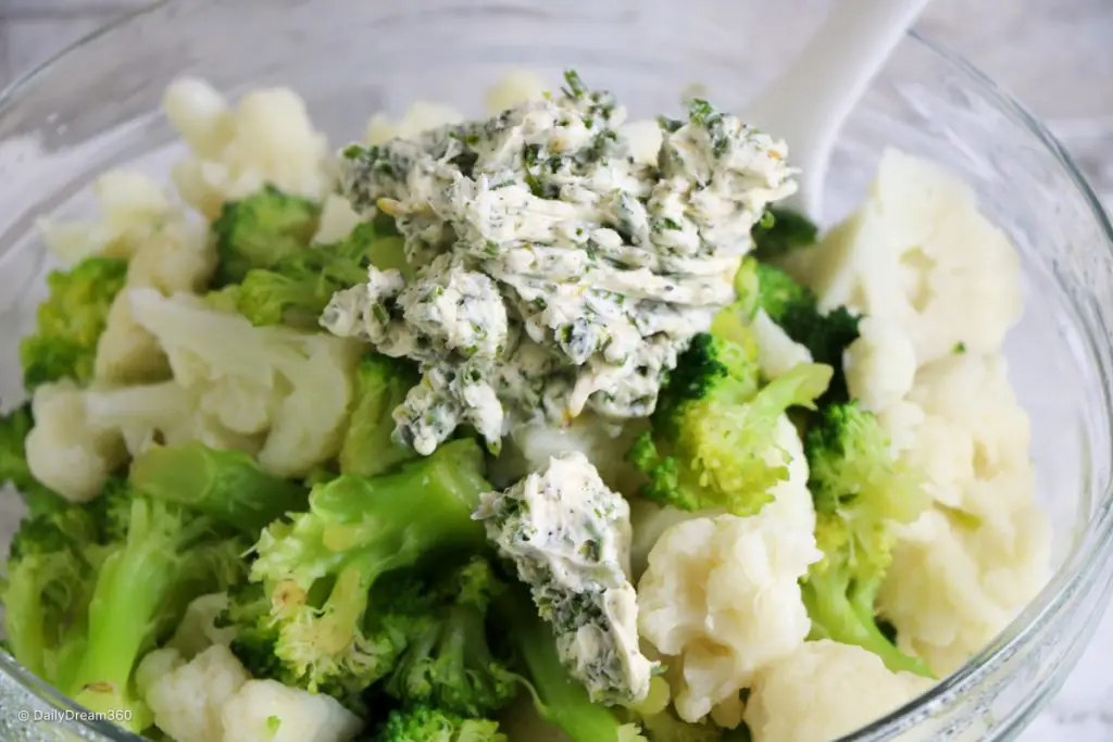 herbed butter on top of Boiled Broccoli and Cauliflower
