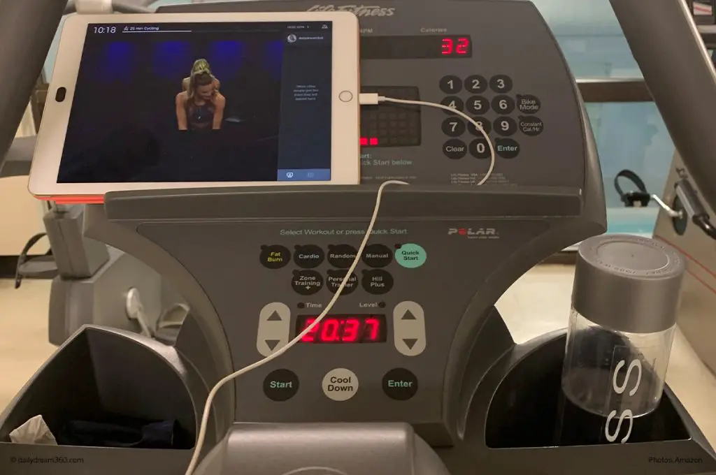 peloton workout on iPad on stationary bike