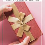 Pin image with text: Ultimate List of the Best Gifts for Her woman holding wrapped gift