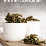 Kale chips in small bowls on wooden board with text Keto-Friendly Seasoned Kale Chips Recipe (Oven Baked or Air Fryer)