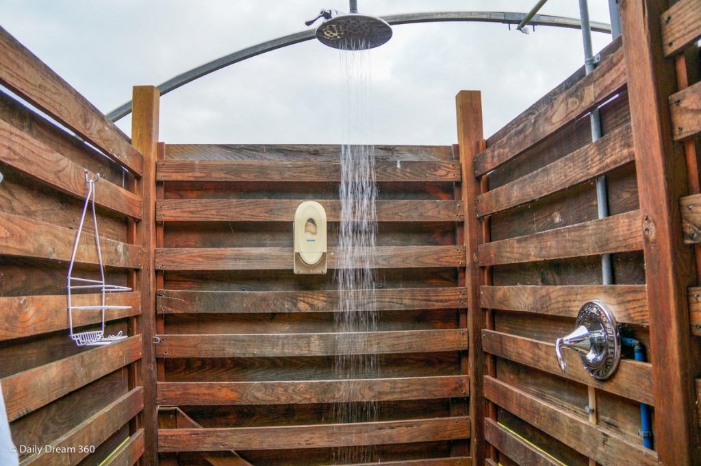 Outdoor shower stall of Wilderness Tent at Long Point Eco Adventures