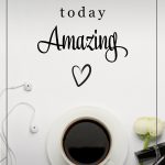 desktop with phone, keyboard, coffee and alarm clock and words make today amazing