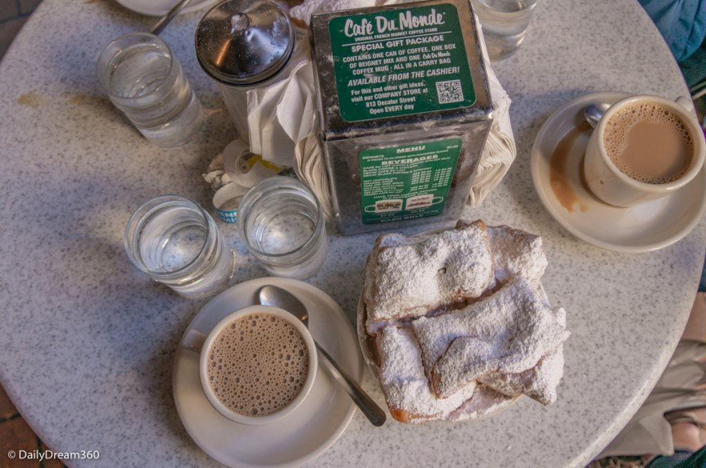 Beignets on table at Cafe du Monde New Orleans