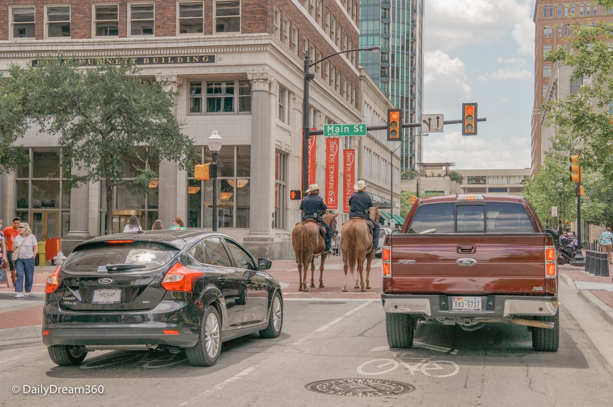 Police on horseback stop at red light in Fort Worth Texas