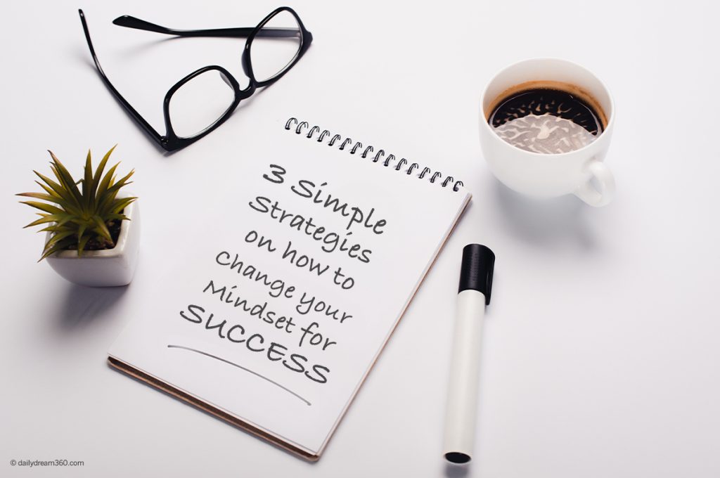 desk with notepad and text: 3 Simple Strategies on How to Change Your Mindset for Success