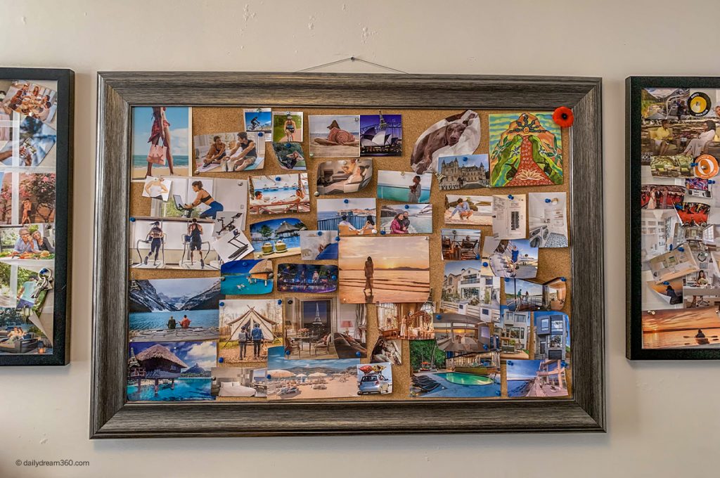 wall with framed vision boards and pictures 