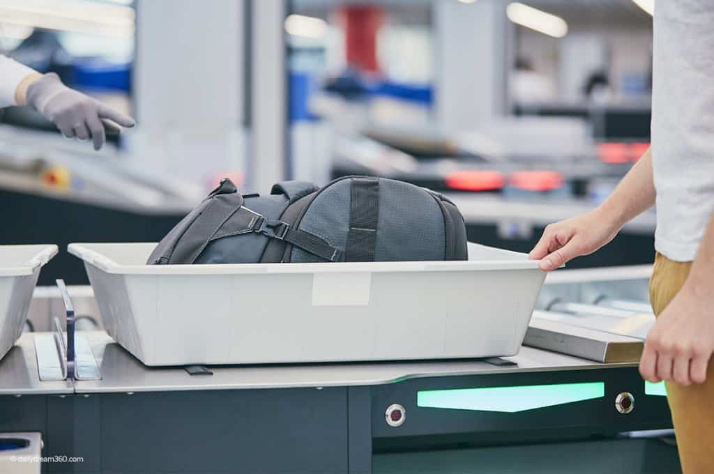 Airport Security bin with bag inside