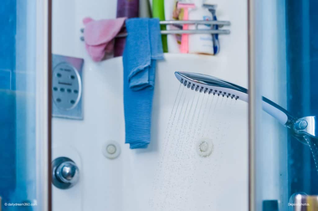 Shower stall and caddy with products