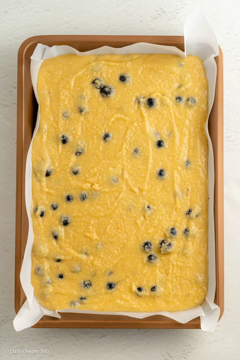 keto blueberry sheet cake mixture in pan