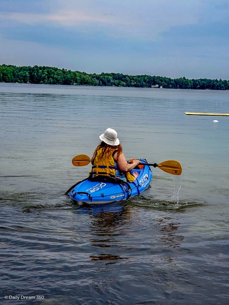 Woman kayaking at Muskoka Beer spa