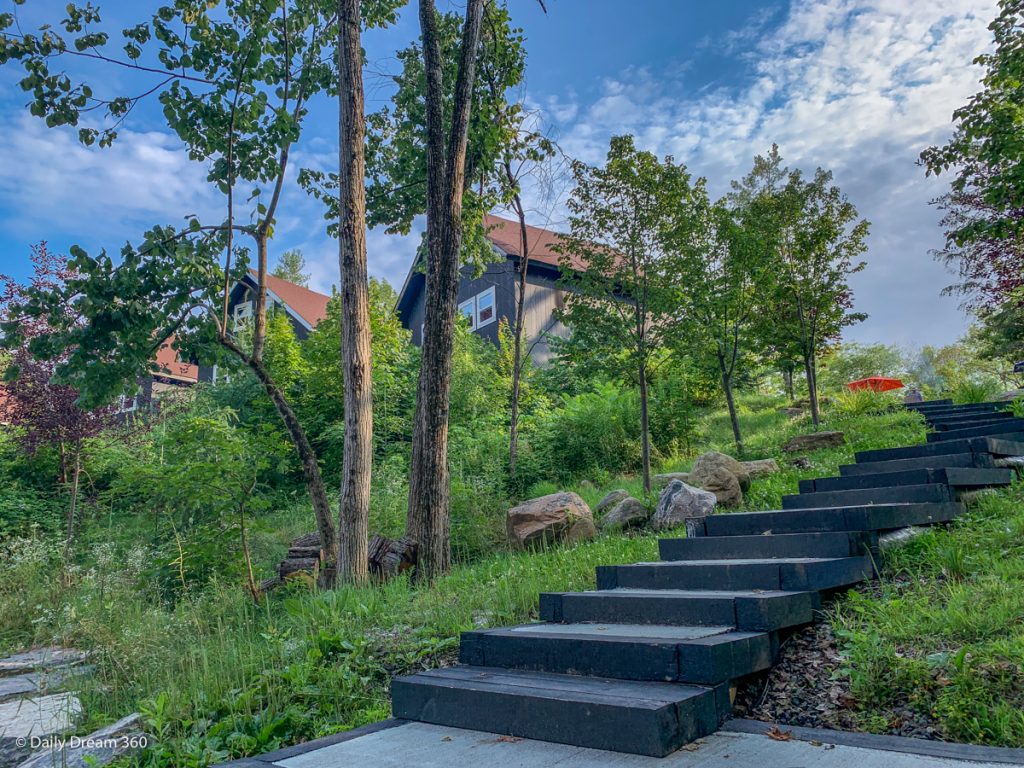 Stairs leading up to cabins at Muskoka Beer Spa Ontario