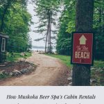 Sign pointing to beach and path with trees to water. Text on image: How Muskoka Beer Spa's Cabin Rentals Make an Easy Vacation from Toronto