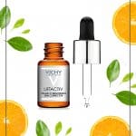 Vichy Vitamin C bottle with oranges and leaves and text: Benefits of Vitamin C in Skincare: Vichy Vitamin C Serum Review