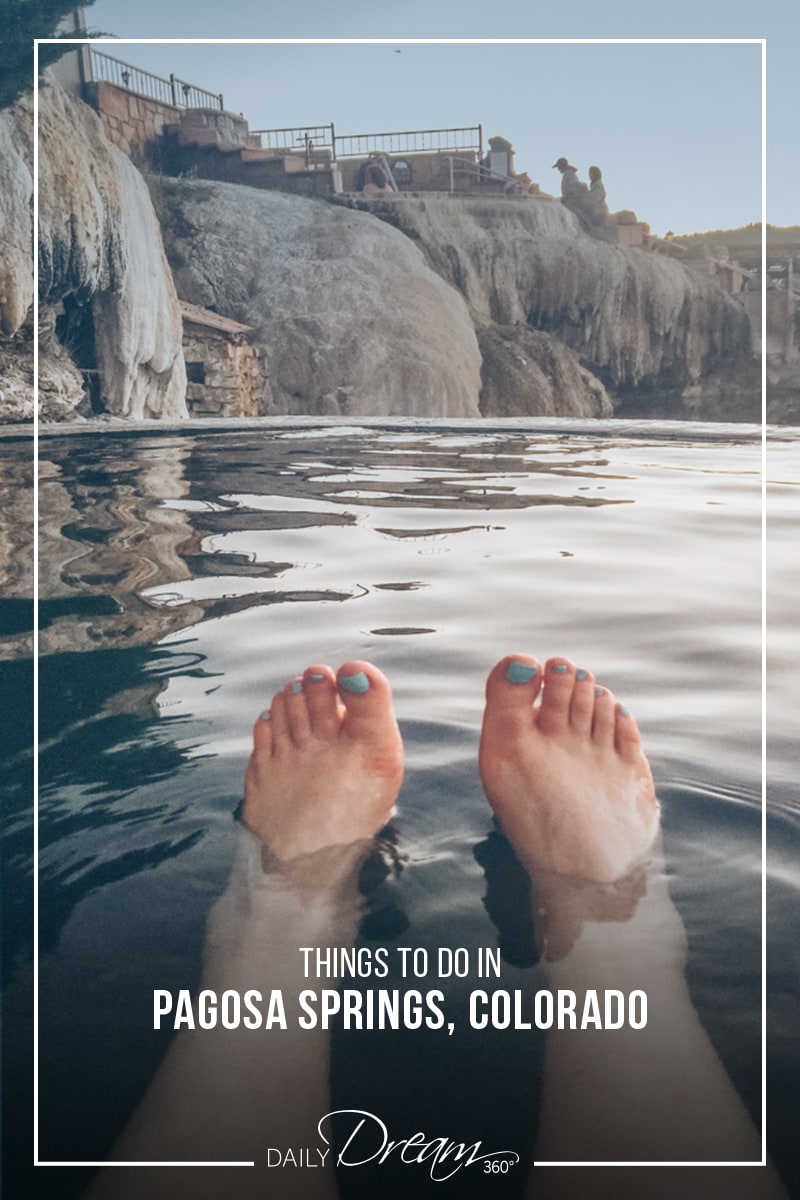 Feet floating in hot spring view of rocks surrounding at Pagosa Springs Colorado