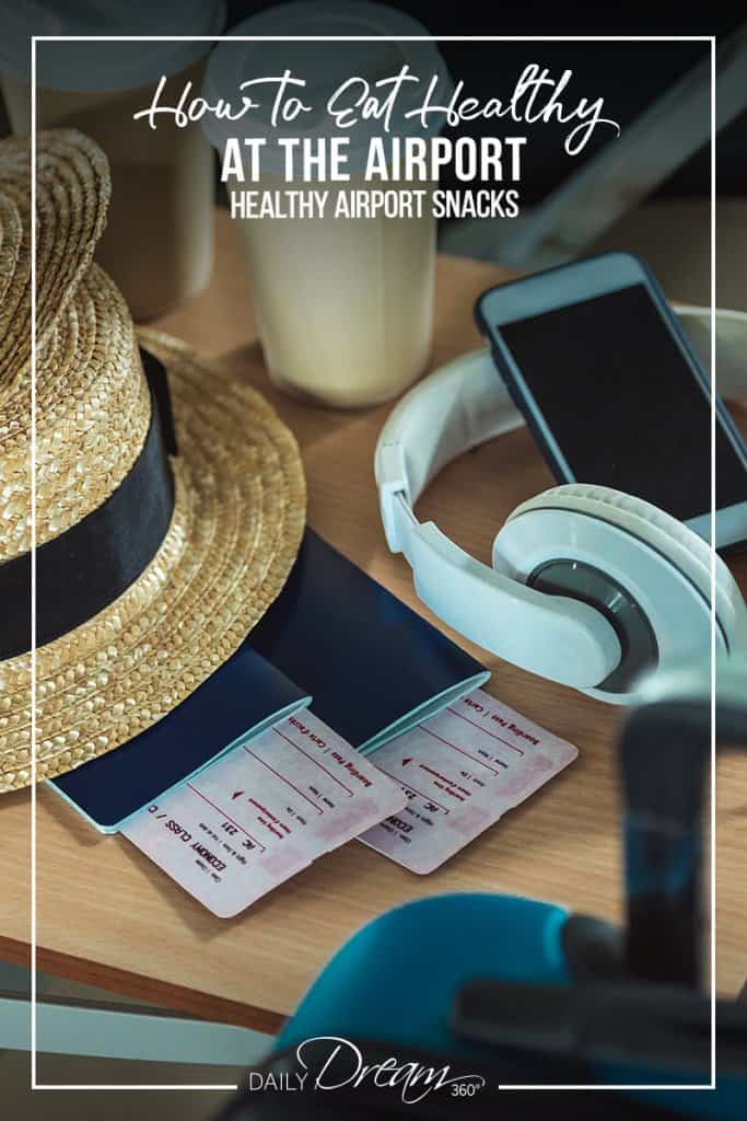 Coffee, headphones and hat on table at airport