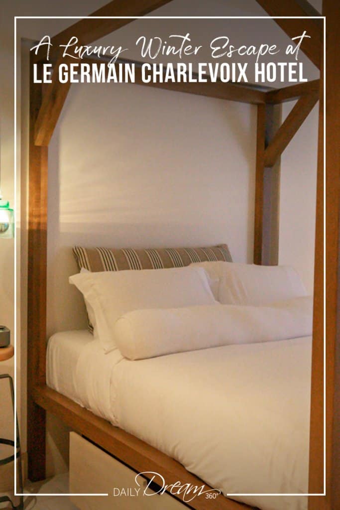 Wood frame bed in Germain Charlevoix Hotel