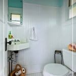 Clean bathroom with text 7-Day Declutter Challenge: Day 4 Cleaning and Organizing Bathrooms