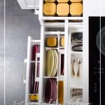 Organized kitchen drawers with text 7 Day Declutter Challenge: Day 6 Declutter Your Kitchen