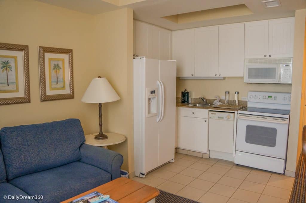 Kitchen and Living room in Studio at Pink Shell Beach Resort