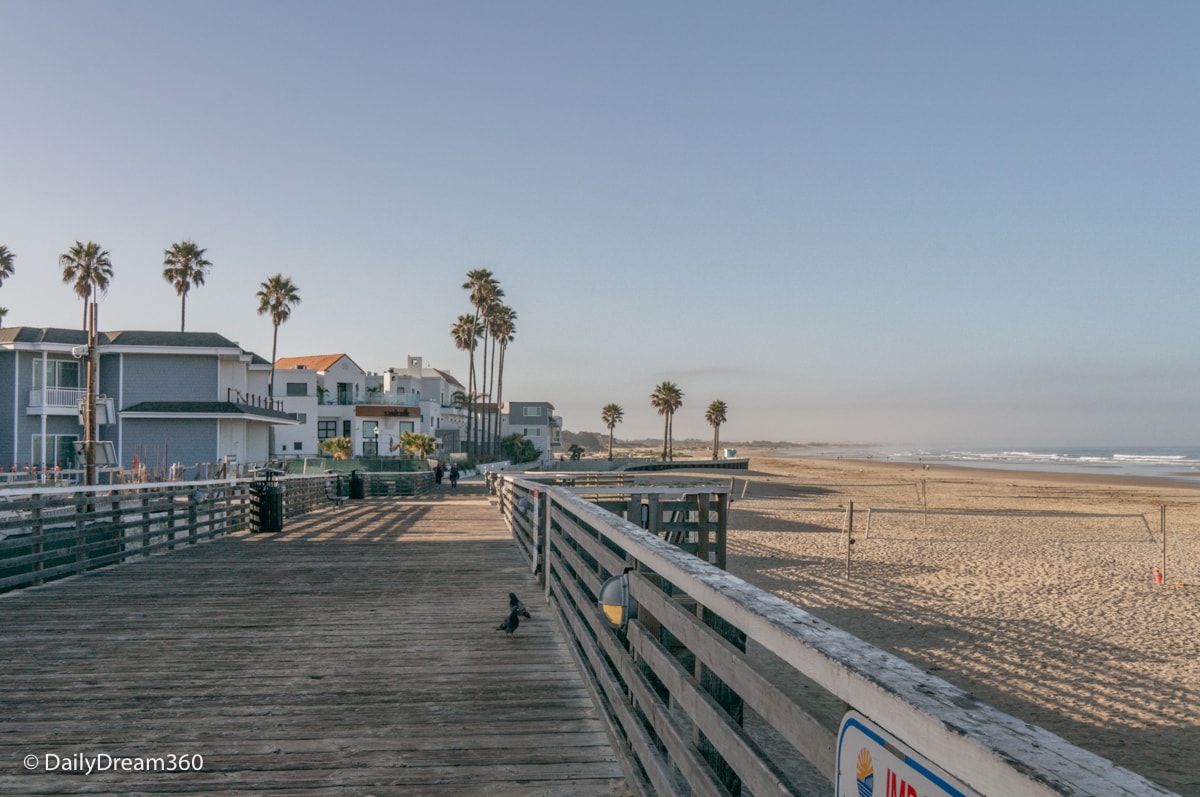 Hotels lined up behind the boardwalk at Pismo Beach California