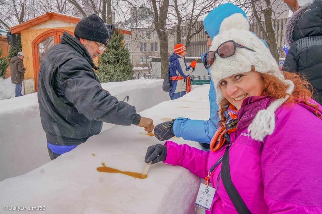 Sampling frozen maple syrup in Quebec City