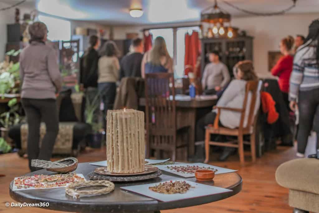 Group sits around table during spiritual retreat at the Hive Centre Orno Ontario