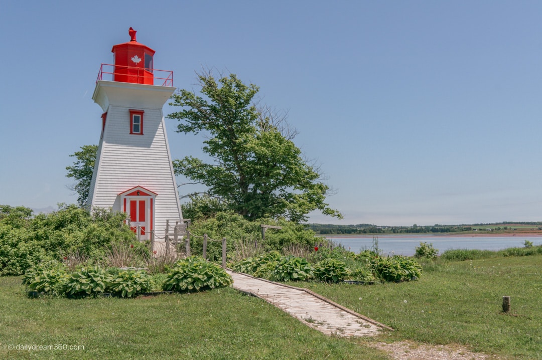 Victoria by the Sea lighthouse in PEI Popular PEI Road Trip stops to the beaches of West Point